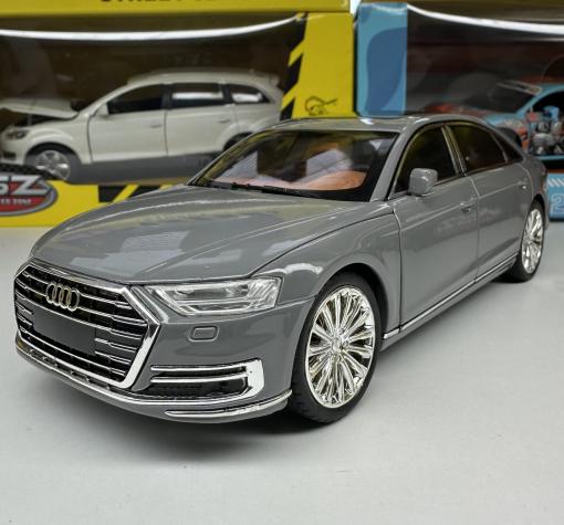 Метална кола с отварящи се врати светлини и звуци Audi A8 1:24