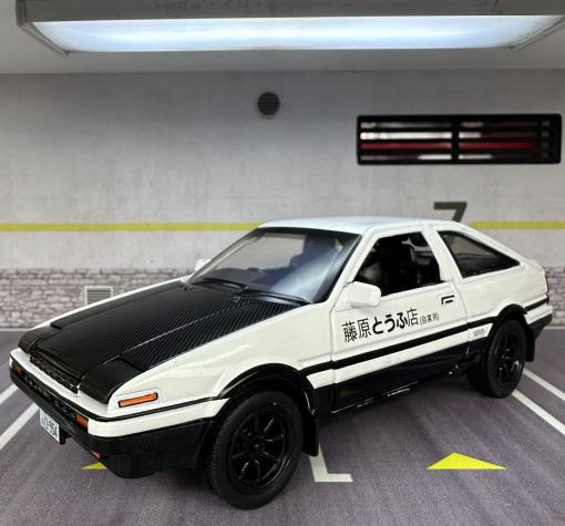 Метална кола с отварящи се врати капаци светлини и звуци Toyota Trueno AE86 1:32