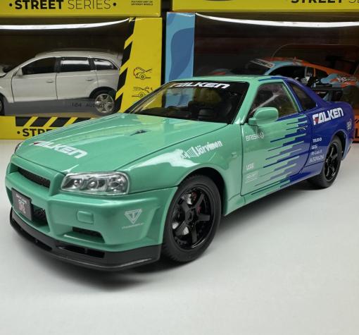 Метална кола с отварящи се врати, светлини и звуци Nissan Skyline GT-R 1:24