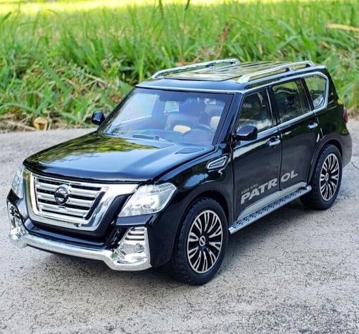 Метален Джип с отварящи се врати капаци светлини и звуци Nissan Patrol 1:24