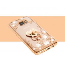 Луксозен силиконов калъф / гръб / TPU с камъни и стойка / сърце / за Samsung S6 Edge G925 - бели цветя / златист кант